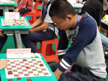 1542934268231054490.jpg 黄靖羲在比赛中.jpg